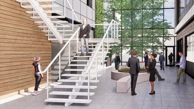 Schéma d'un atrium et d'un escalier menant à l'étage.