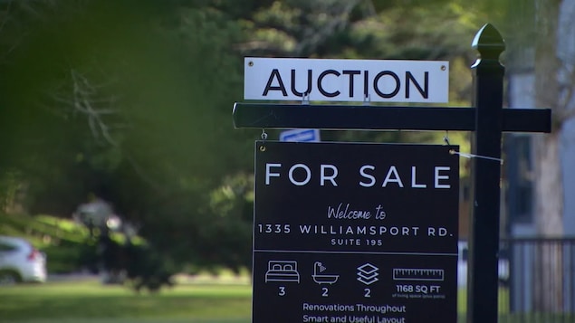 A for sale sign put up by On The Block Auctions, a real estate company that offers a transparent bidding process through online auctions.