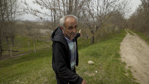 Otar pointed to the forest.