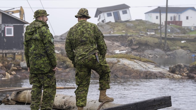 Canadian Armed Forces personnel on Burnt Island, Newfoundland and Labrador, September 28, 2022, days after Hurricane Fiona hit.