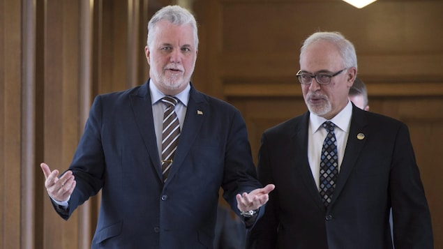 Le premier ministre Philippe Couillard et le ministre des Finances Carlos Leitao