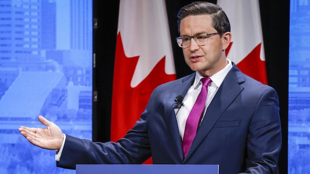 Candidate Pierre Poilievre makes a point at the Conservative Party of Canada English leadership debate in Edmonton, Alta., Wednesday, May 11, 2022. 