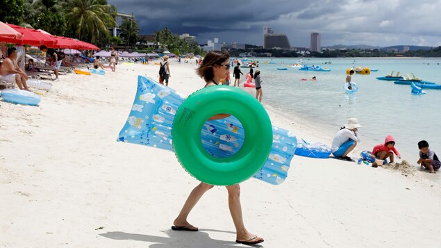 Des touristes sur une plage
Des touristes sur une plage