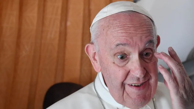 Pope Francis speaks with journalists on board a plane en route from Bratislava, Slovakia, back to Rome on Sept. 15. The Pope noted that children have long received vaccines for diseases other than COVID-19 with little complaint.