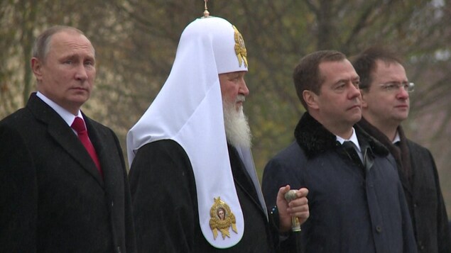Vladimir Poutine et le patriarche côte à côte Vladimir Poutine et le patriarche côte à côte