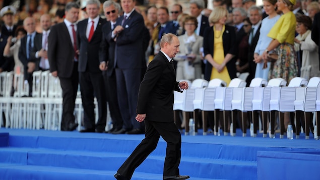 Vladimir Poutine, le 6 juin 2014, lors des commémorations du 70e anniversaire du jour J, à Ouistreham, en France. 