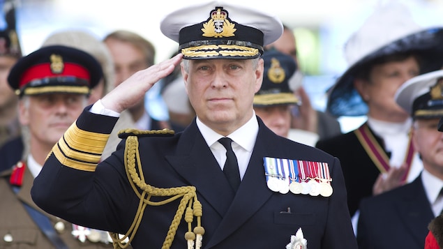 
Prince Andrew waves to servicemen during a parade on Armed Forces Day, June 27, 2015.