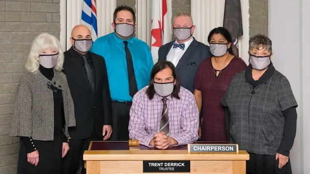 Prince George School District 57 Board Chair Trent Derrick, seated, and Vice-Chair Shuirose Valimohamed, second from right, have resigned citing systemic racism identified in a provincial Special Advisors Report released in late August 2021.
