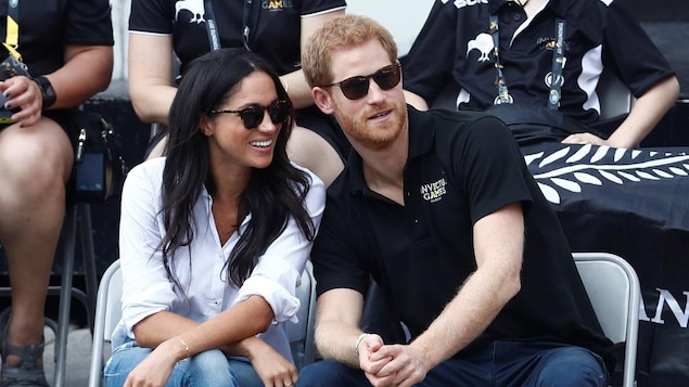 Britain's Prince Harry sits with Meghan Markle to watch a wheelchair tennis event during the Invictus Games in Toronto, Ontario, Canada September 25, 2017.
