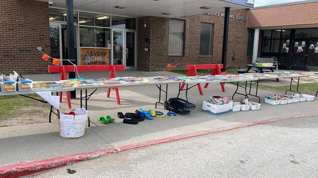 Tables in front of a school.