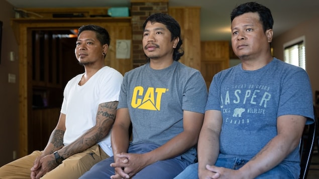 Raddy Adams Manicadao, Jafferson Palabasan and Rene Logrinio have all applied to be permanent residents, but without any income, they worry they will have to leave Canada. 