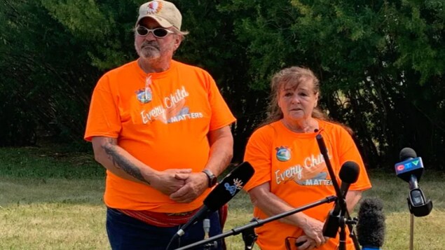 Doug Montgomery and Donna McBain own a 13-acre field on the northeast edge of the tiny hamlet of Delmas, Sask. The couple gave briefs remarks in Delmas this past weekend as Battlefords Agency Tribal Chiefs began its search for unmarked graves related to a residential school in the area.