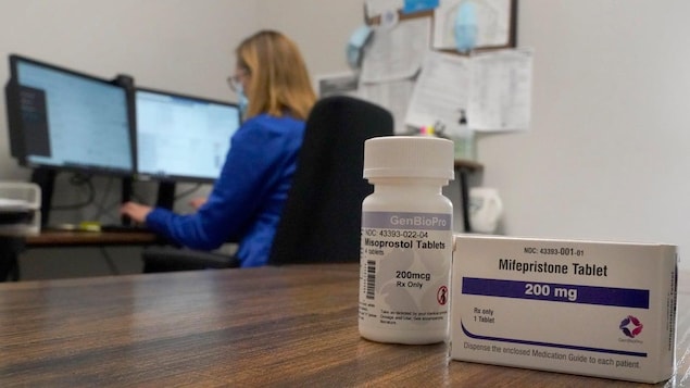 A nurse practitioner works in an office at a Planned Parenthood clinic in the United States. In Quebec, hundreds of doctors have signed an open letter calling for the abortion pill to be more accessible.