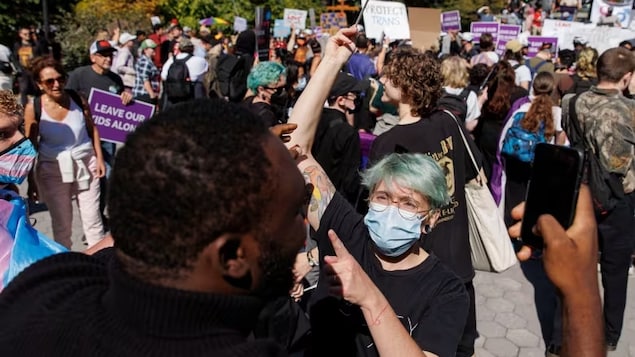 Protesters and counter-protests take to the streets over gender and sexual education in schools at Queen's Park in Toronto on Wednesday. (Evan Mitsui/CBC)