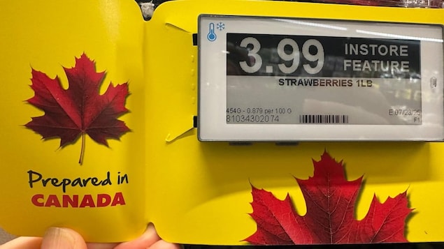 A strawberry shelf label indicating "Prepared in Canada".
