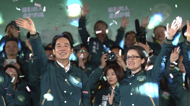 Taiwanese Vice President Lai Ching-te, also known as William Lai, left, celebrates his victory with running mate Bi-khim Hsiao in Taipei, Taiwan, Saturday, Jan. 13, 2024. Ruling-party candidate Lai Ching-te has emerged victorious in Taiwan’s presidential election and his opponents have conceded. The result in Taiwan’s presidential and parliamentary election will chart the trajectory of relations with China over the next four years. (AP Photo/Chiang Ying-ying)