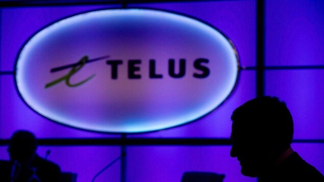 Un panneau de Telus lors du congrès annuel de l'entreprise à Vancouver le 8 mai 2014.