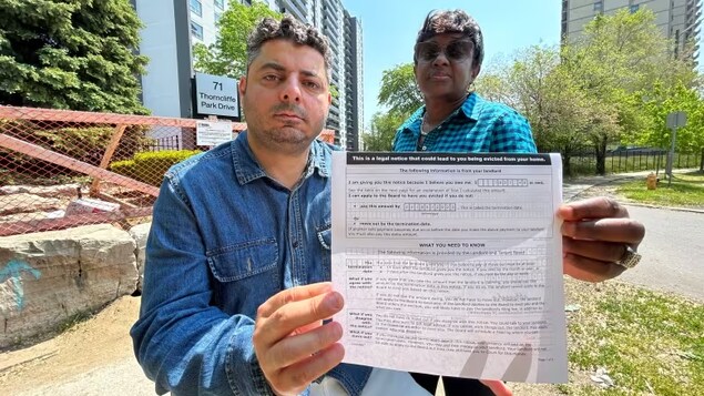 Khalil Aldroubi and Tricia-Ann Israel are tenants at the Thorncliffe Park apartment complex who are on a rent strike to protest proposed above-guideline rent increases. (Ken Townsend/CBC)