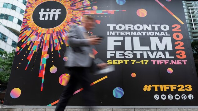 A TIFF sign at King Street and Spadina Avenue in Toronto during the 2023 festival. A spokesperson for TIFF said the festival appreciates the sustainability concerns being brought forward. (Michael Wilson/CBC)