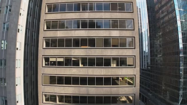 This mid-rise office tower in downtown Toronto is the type of building that could be strong candidate for converting to residential use because it's not too old, not too big and has many windows. (Patrick Morrell/CBC)