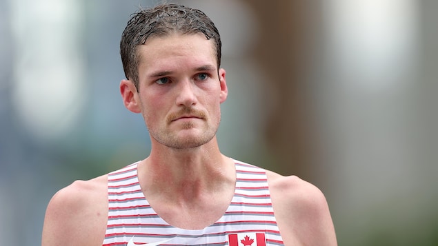 Gros plan sur Trevor Hofbauer, visiblement ému et déçu.