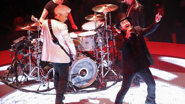 Adam Clayton, Larry Mullen Jr., Bono and The Edge of the Irish rock band U2 perform during the "Experience + Innocence" tour at the United Center in Chicago on May 23, 2018. (Photo by Kamil Krzaczynski / AFP) (Photo credit should read KAMIL KRZACZYNSKI/AFP/Getty Images) Adam Clayton, Larry Mullen Jr., Bono and The Edge of the Irish rock band U2 perform during the "Experience + Innocence" tour at the United Center in Chicago on May 23, 2018. (Photo by Kamil Krzaczynski / AFP) (Photo credit should read KAMIL KRZACZYNSKI/AFP/Getty Images)