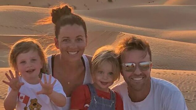 Calgary-native Katie Gibson — pictured at the beach in Abu Dhabi with her husband Ben and three-year-old twins Nash and Brooklyn — felt it was important to take the first COVID-19 vaccine available to her in the United Arab Emirates. She was dismayed to learn Ottawa may still require her to quarantine for 14 days if she enters Canada, even if it lifts that restriction for those who have vaccines approved by Health Canada.