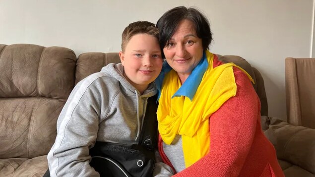 Valentyna Kozachenko and her son, Dmytro, fled Ukraine after the war broke out in late February. They arrived in Montreal about a week ago. (Chloe Ranaldi/CBC)