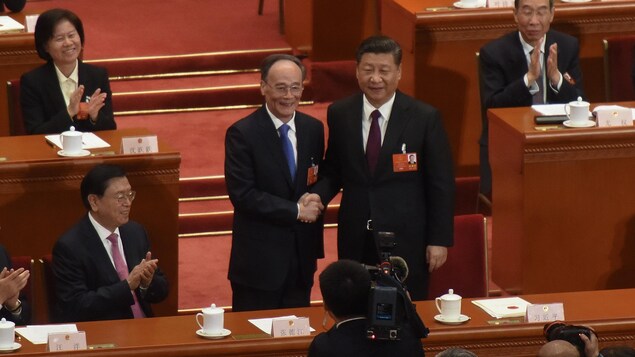 Les deux politiciens lors de la 5e session plénière de la 13e Assemblée populaire nationale le 17 mars 2018. Les deux politiciens lors de la 5e session plénière de la 13e Assemblée populaire nationale le 17 mars 2018.