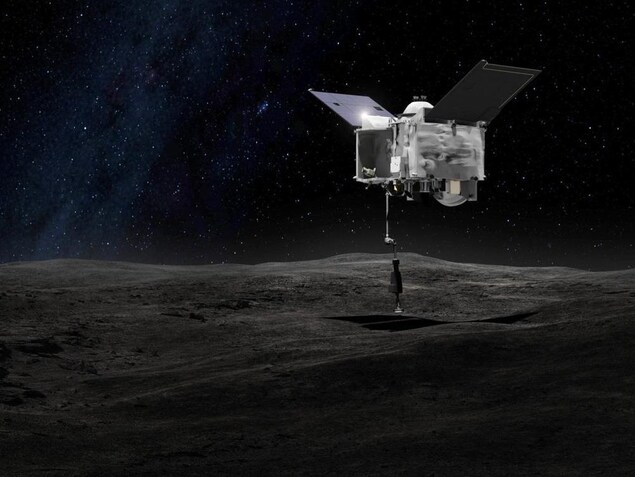 Représentation artistique de la sonde Osiris-Rex recueillant des échantillons à la surface de l'astéroïde Bennu. Représentation artistique de la sonde Osiris-Rex recueillant des échantillons à la surface de l'astéroïde Bennu.