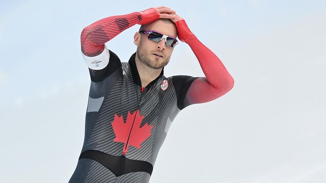 Laurent Dubreuil, les mains sur la tête, à la fin de sa course.