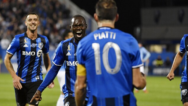 Les joueurs de l'Impact célèbrent un but. Les joueurs de l'Impact célèbrent un but.