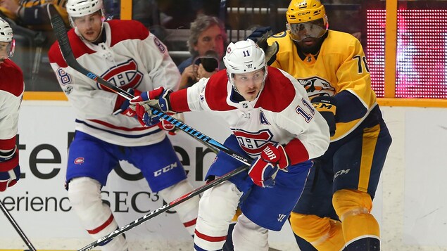 Brendan Gallagher (no 11) et P.K. Subban (no 76) se disputent la possession de la rondelle. Brendan Gallagher (no 11) et P.K. Subban (no 76) se disputent la possession de la rondelle.