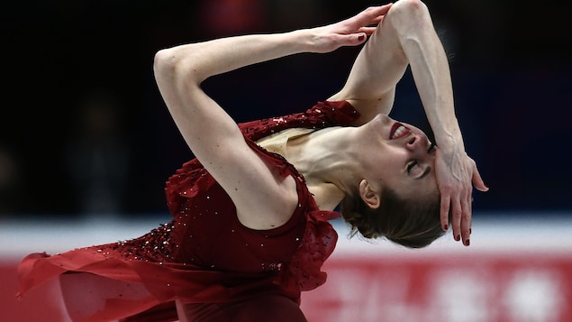 Carolina Kostner lors de son programme court aux mondiaux de patinage artistique, à Milan, en Italie. Carolina Kostner lors de son programme court aux mondiaux de patinage artistique, à Milan, en Italie.