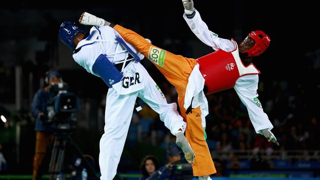 Cheick Cissé au cours de son combat pour la médaille d'or Cheick Cissé au cours de son combat pour la médaille d'or