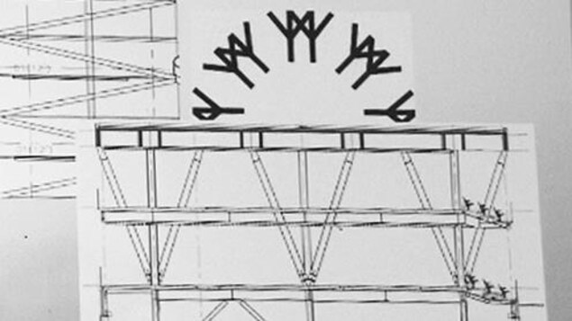 Les structures métalliques sont superposées sur l'emblème. Les structures métalliques sont superposées sur l'emblème.