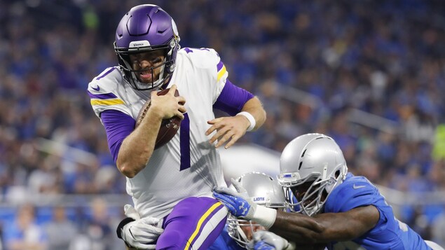 Case Keenum a lancé deux passes de touché en plus d’en marquer un autre au sol pour permettre aux Vikings du Minnesota de vaincre les Lions de Détroit 30-23, jeudi, au Michigan. Case Keenum a lancé deux passes de touché en plus d’en marquer un autre au sol pour permettre aux Vikings du Minnesota de vaincre les Lions de Détroit 30-23, jeudi, au Michigan.