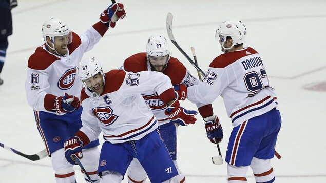 Le Canadien l'a emporté 5-4 en prolongation contre les Jets de Winnipeg. Le Canadien l'a emporté 5-4 en prolongation contre les Jets de Winnipeg.