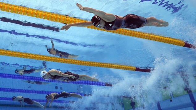 Kelsey Lauren Wog is underwater in the 200m breaststroke.