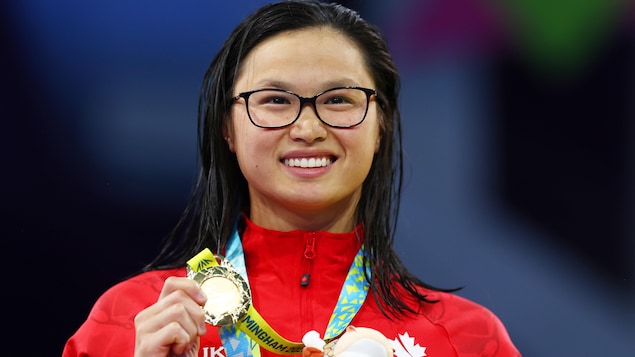 加拿大泳手麦克尼尔（Margaret MacNeil）赢得金牌。