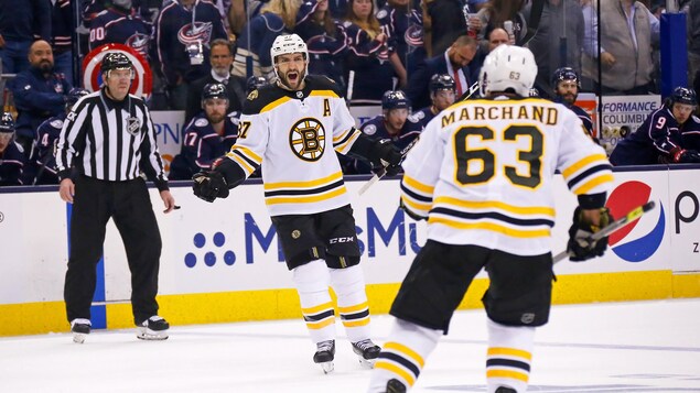 Patrice Bergeron (à gauche) et Brad Marchand