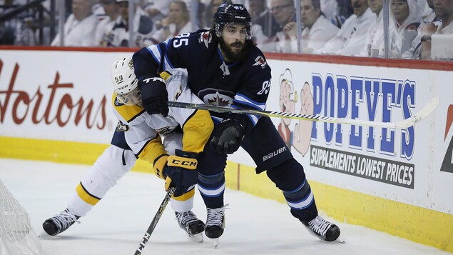 Roman Josi et Mathieu Perreault.
