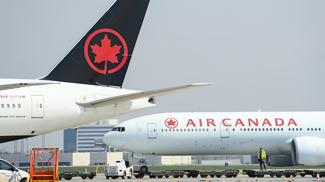 An Air Canada flight taxis on the tarmac at Pierre Elliott Trudeau International Airport in Montreal on May 16.