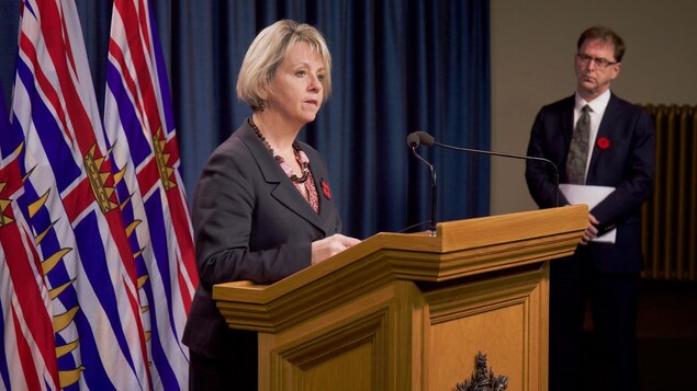Bonnie Henry et Adrian Dix.
