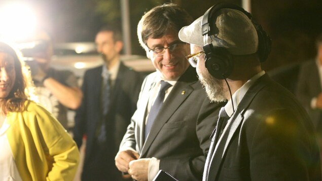 Le réalisateur Alexandre Chartrand en compagnie du président nationaliste de la Catalogne, Carles Puigdemont.