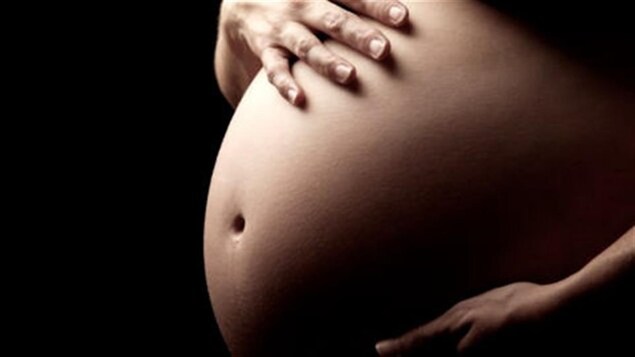 Ventre de femme enceinte.