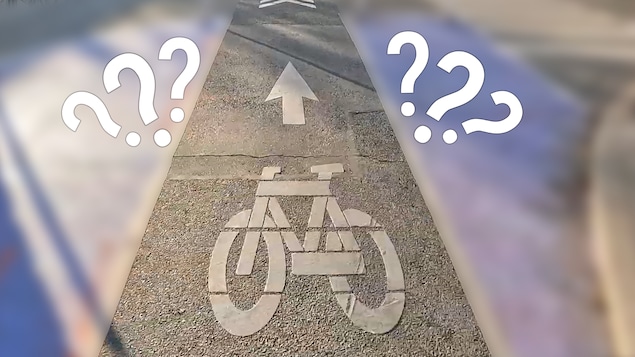 signe d'une piste cyclable sur le sol.