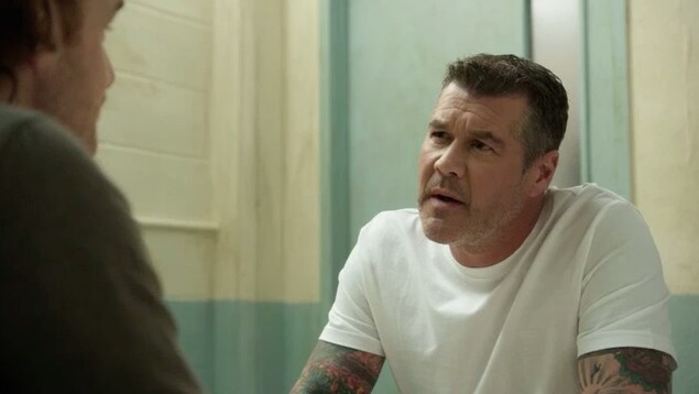 Le personnage de District 31 en prison. Le personnage de District 31 en prison.