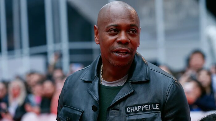 Dave Chappelle, seen at the Toronto International Film Festival in September 2018, is under fire for comments he made about trans people in his recent Netflix comedy special, The Closer.