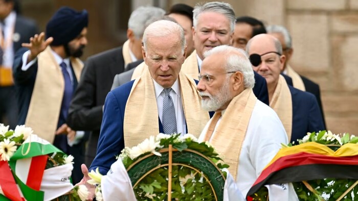 U.S. President Joe Biden, center, Indian Prime Minister Narendra Modi and other G20 leaders arrive to pay their tributes at the Rajghat, a Mahatma Gandhi memorial, in New Delhi, India on Sept. 10, 2023. (Kenny Holston/AP)